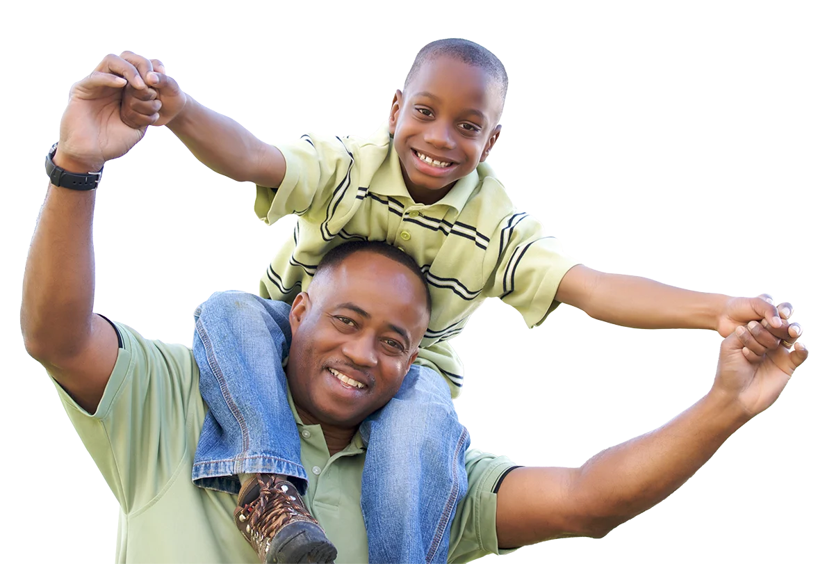 man with son on shoulders