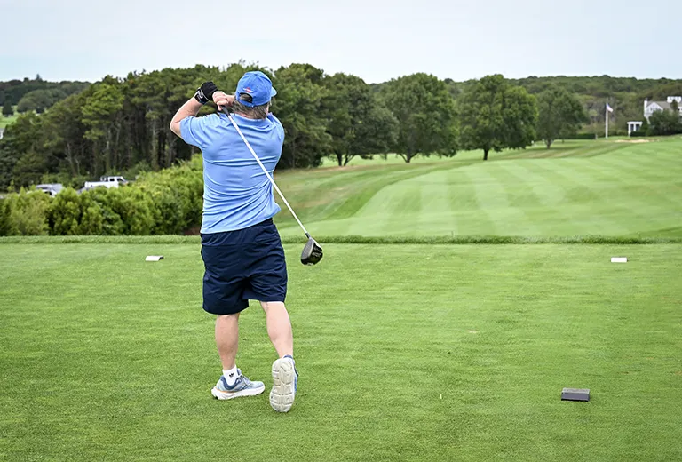 Golfer taking a swing