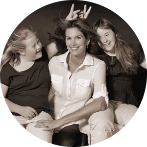 Cindy Crawford, Best Buddies Global Ambassador and Supermodel, poses with two female Best Buddies program participants.