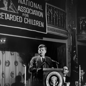 President John F. Kennedy speaking to Congress on behalf of the National Association for Retarded Children.
