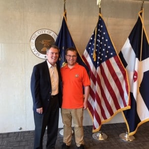 matt and mayor with flags