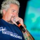 Guy Fieri Talks Television Fame, Home Cooking and Teaming Up with Tom Brady for a Good Cause