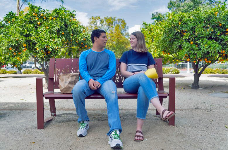 Two Participants sitting on a bench