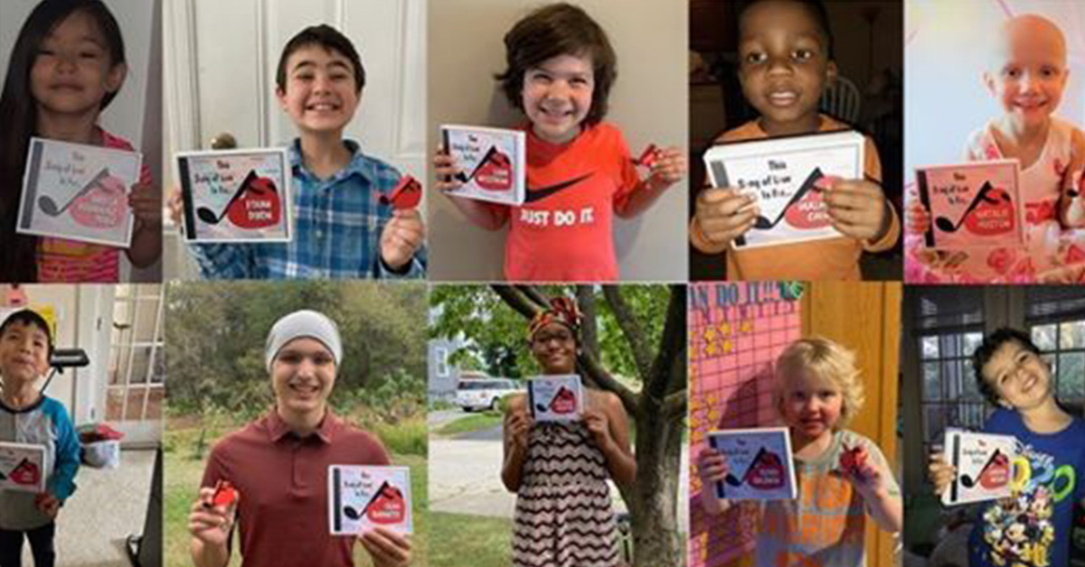 Photo of kids holding cds