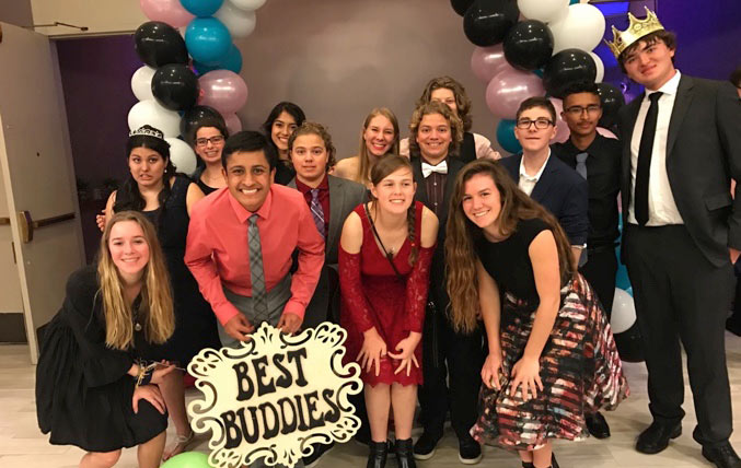 Maanav-Kooner-group Best Buddies in California participant Maanav Kooner celebrating with members of his Best Buddies friends.
