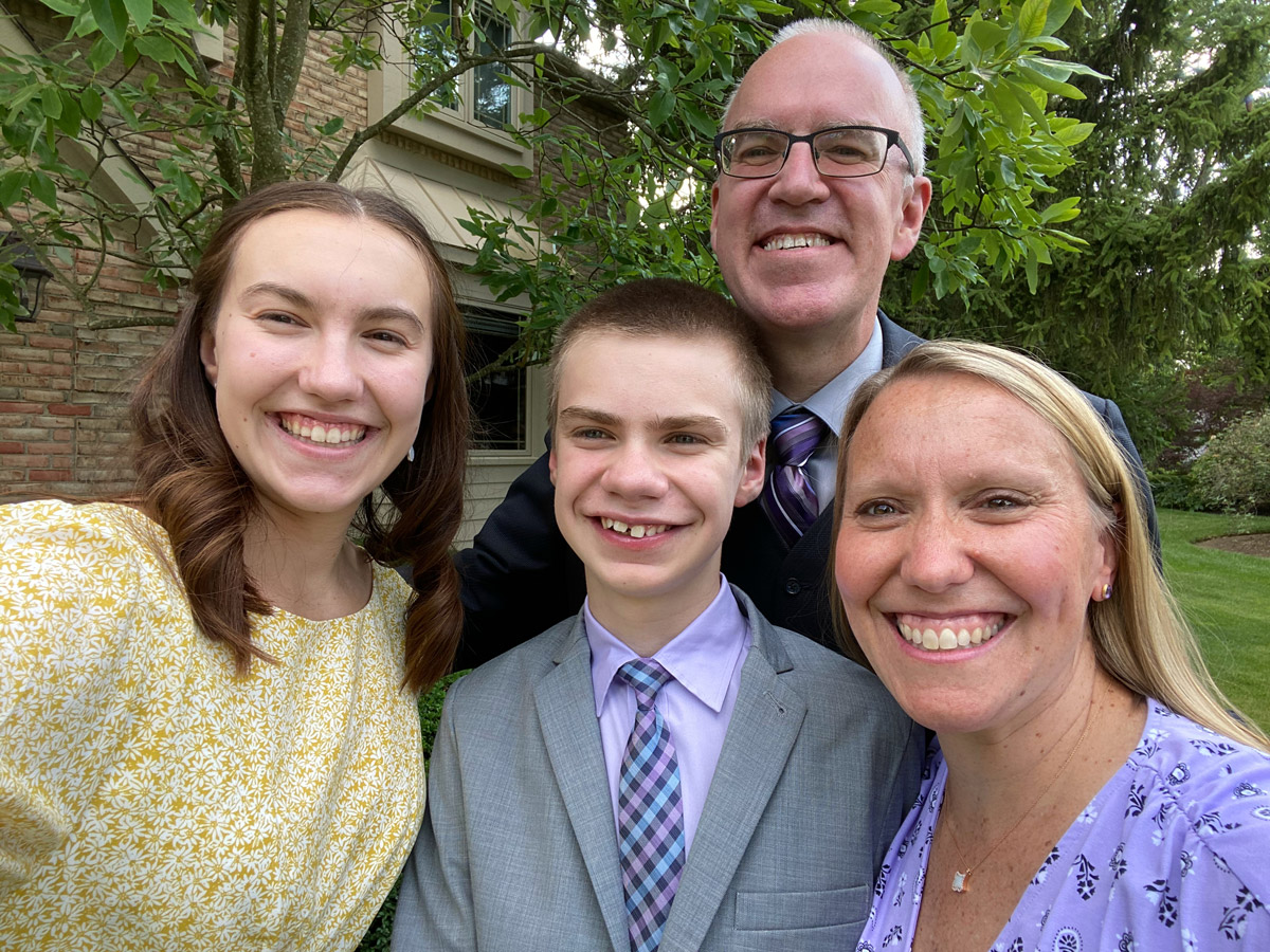 2021-BBOH-Tina-Beery2 Best Buddies in Ohio parent Tina Charles-Beery smiling with husband and two children, Best Buddies chapter members Meghan and Aidan