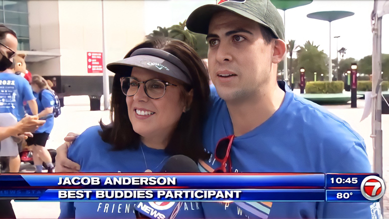Best Buddies Friendship Walk in Sunrise, Florida. Jacob Anderson, Best Buddies participant is hugging Jan Risi,IPC, CEO