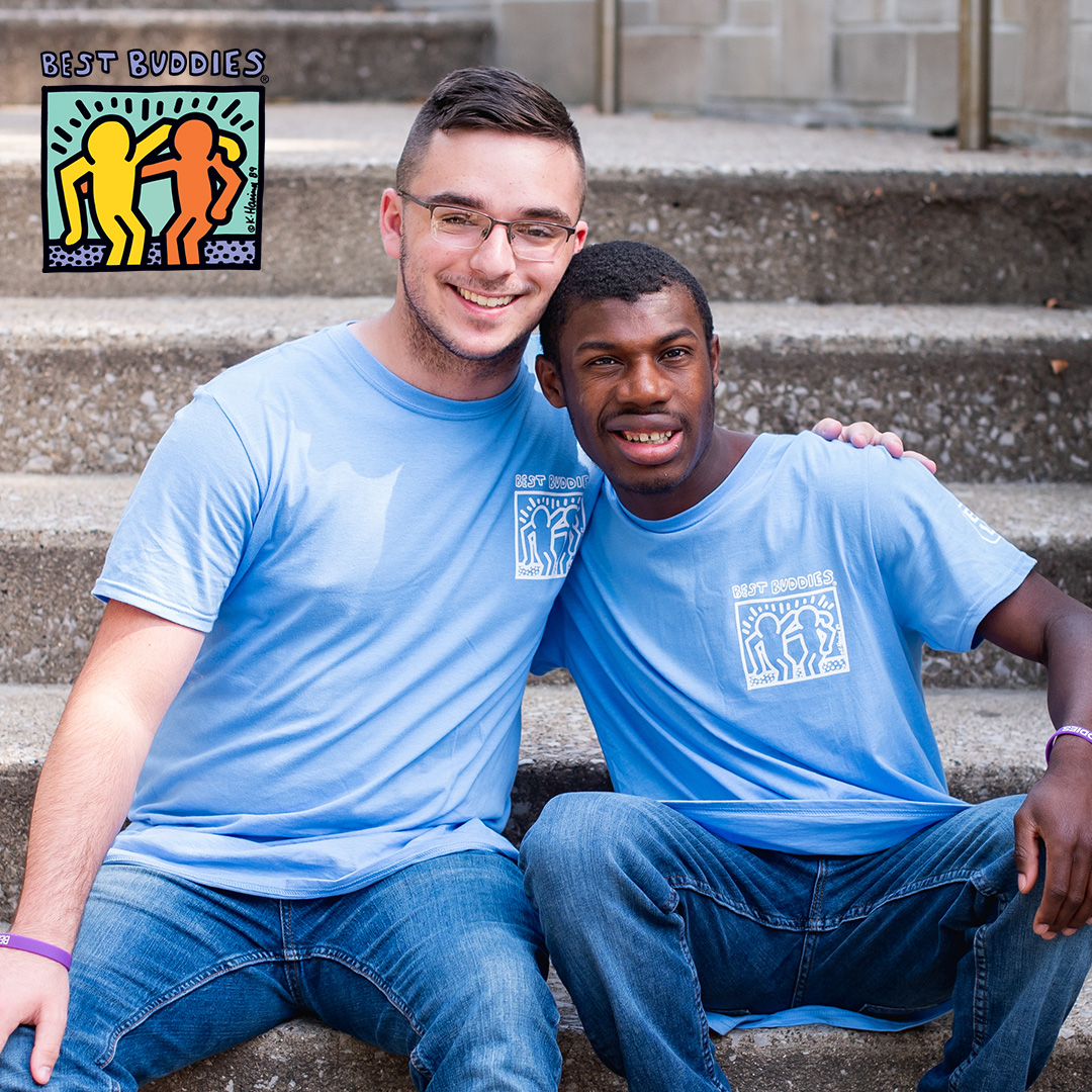 Male Buddy Pair sitting on stairs with arms on shoulders