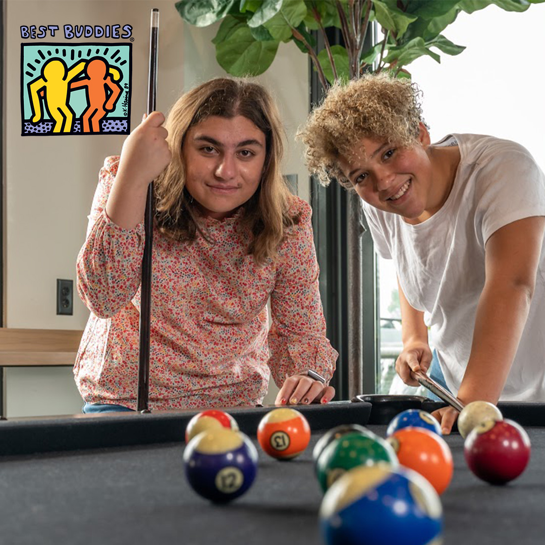 Best Buddies Living Participants Playing Pool