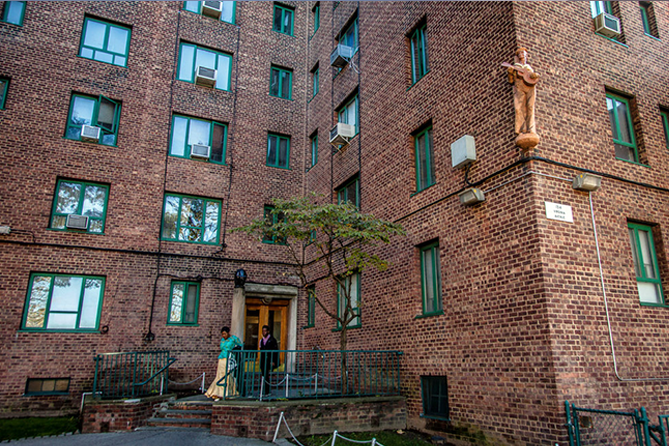 Deeper Sense of Belonging: One Perspective on Black History Month: A brick Apartment Building in Bronx, New York