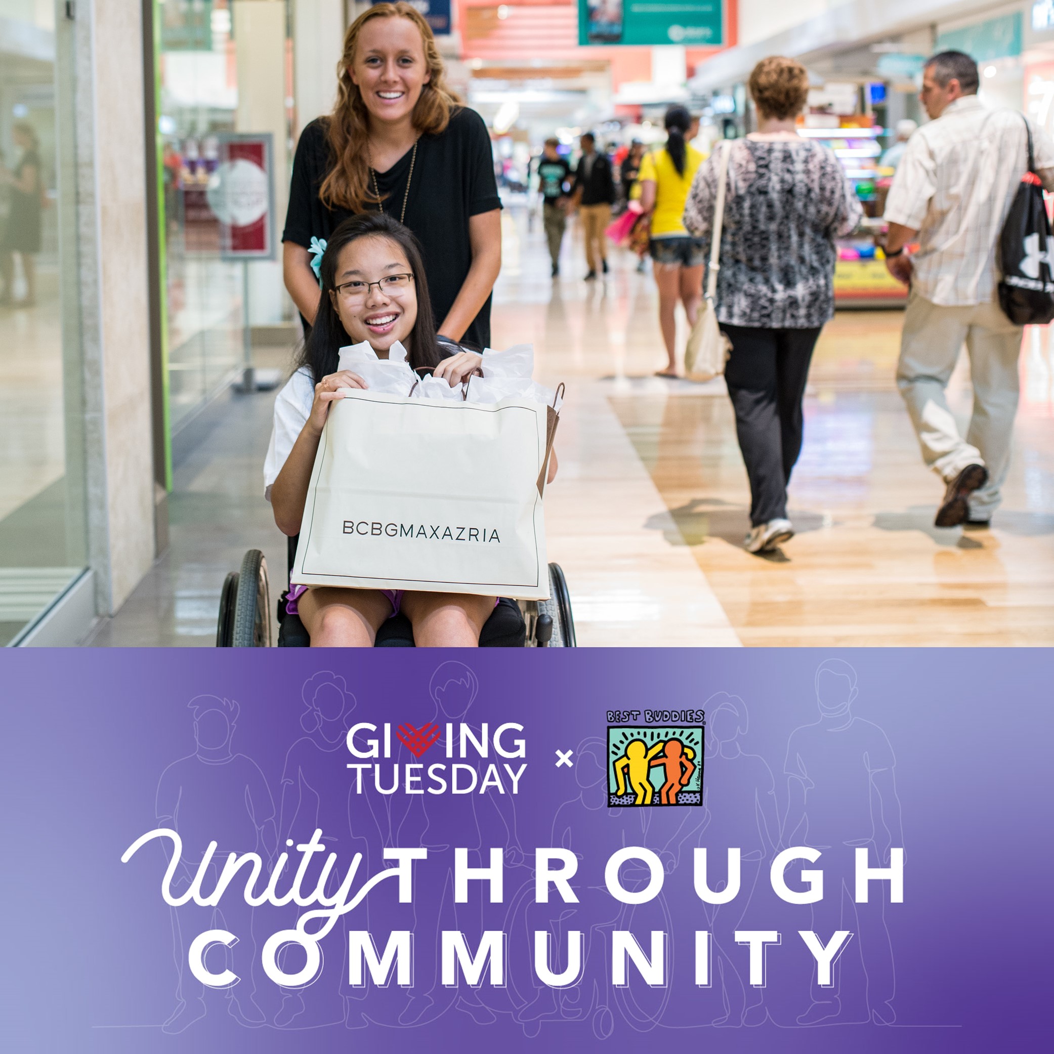 Two female Best Buddies Friendship participants shopping in a mall.