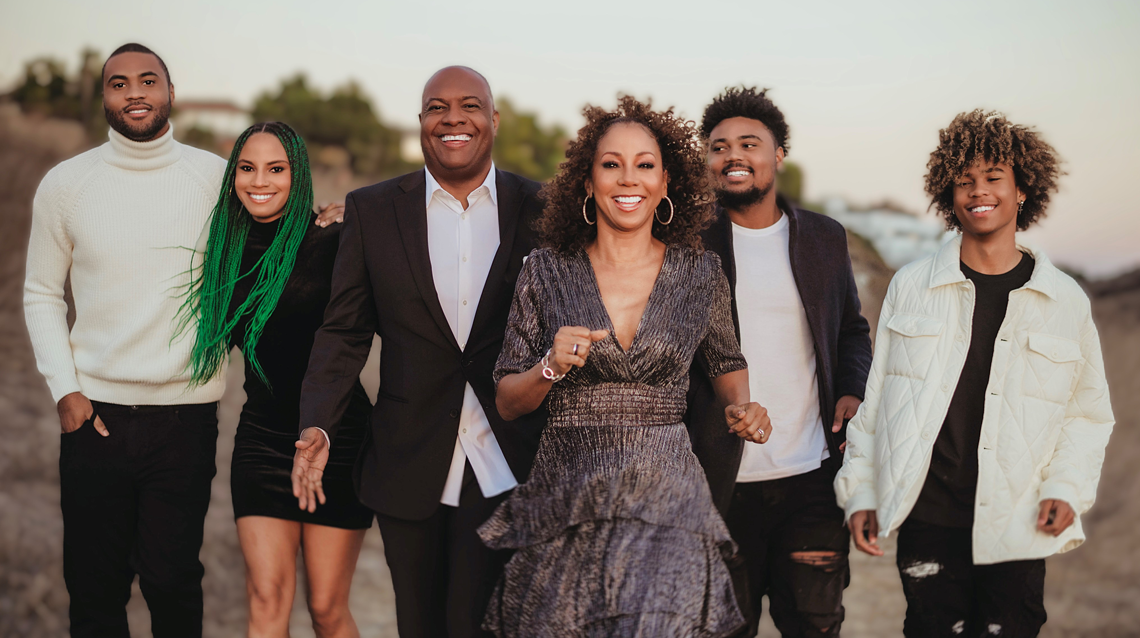Best Buddies’ Mother of the Year — Holly Robinson Peete, and her family are on a Beach.