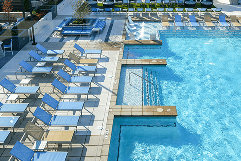 The apartments in Atlanta, Georgia used for the the Best Buddies Living Program features a large pool and plenty of chaise lounges.