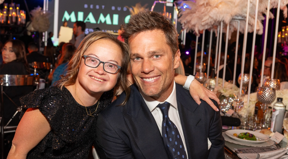 Best Buddies Global Ambassador Katie Meade and NFL legend and Best Buddies Global Ambassador Tom Brady, share a moment at the Best Buddies Miami Gala.
