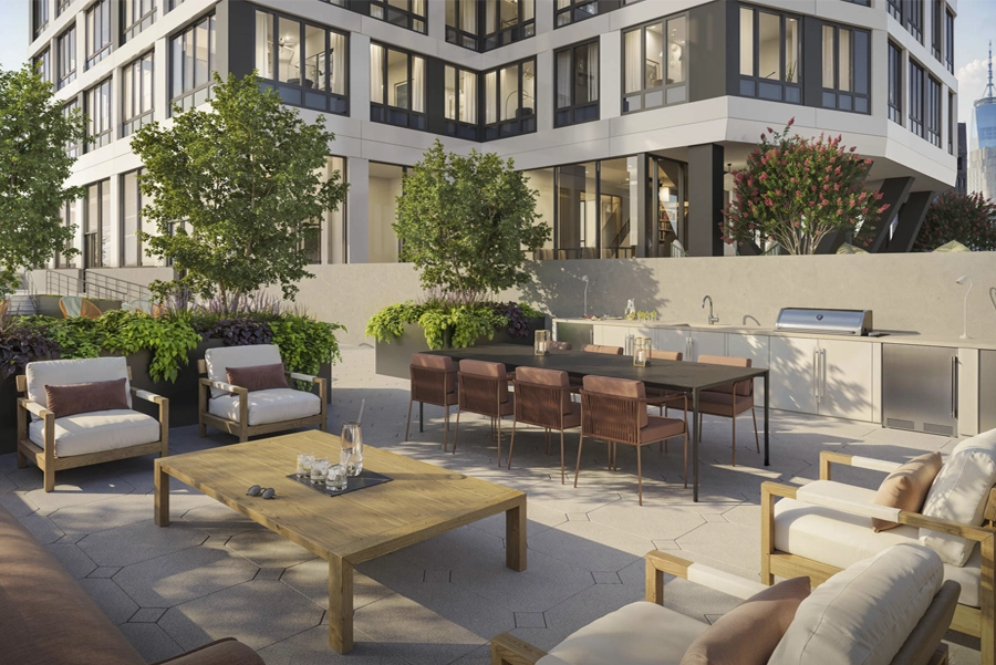 Living - NY, NY SoMA Terrace Landscaped apartment terrace with lounge seating, dining table, and outdoor kitchen in New York City.