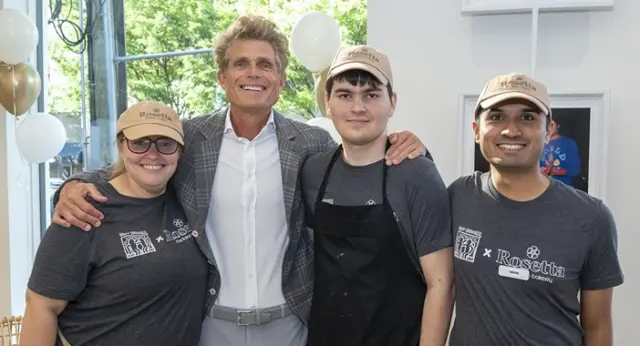 News Rosetta Bakery Featured Image Best Buddies participants and Rosetta Bakery team members posing together at a bakery event.