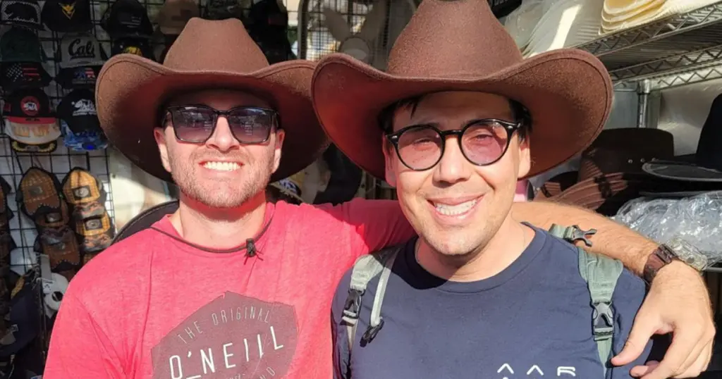 riley and tom in cowboy hats