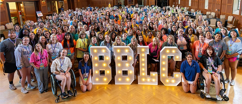 206 News Inclusion promoted Large group of Best Buddies Leadership Conference participants posing with illuminated BBLC letters