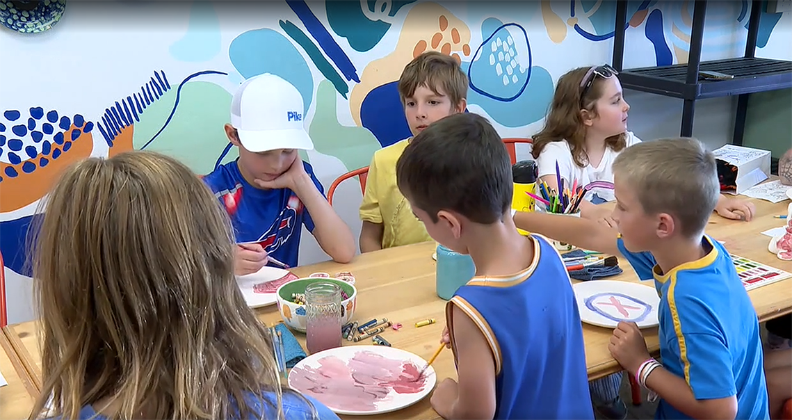2024 Siblings - Best Buddies expands post Children participating in an arts and crafts activity together at a Best Buddies event.